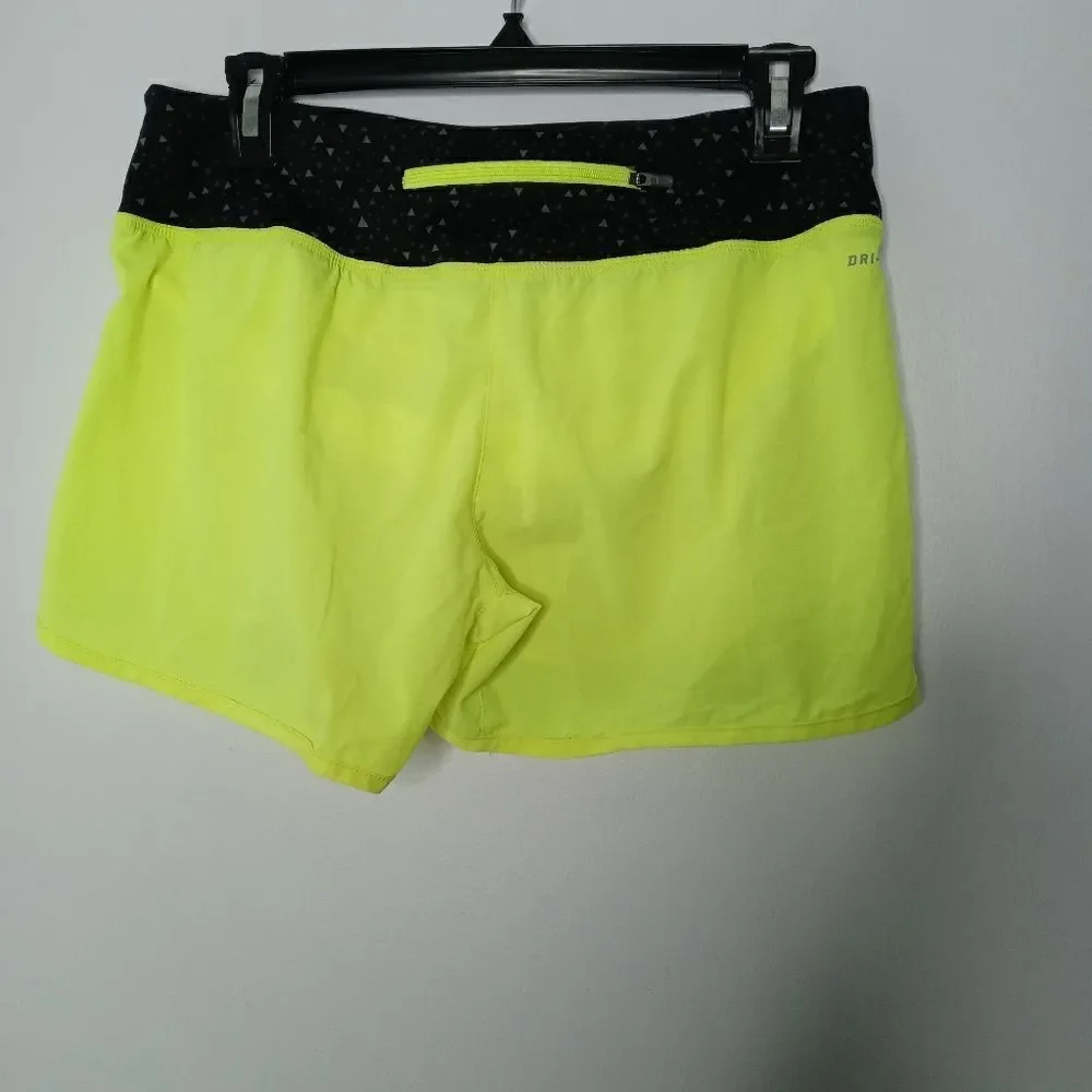 Nike neon yellow shorts size spots